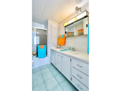 Located on a spacious corner lot in the heart of the highly on Fairway Village Golf Course in Florida - for sale on GolfHomes.com, golf home, golf lot