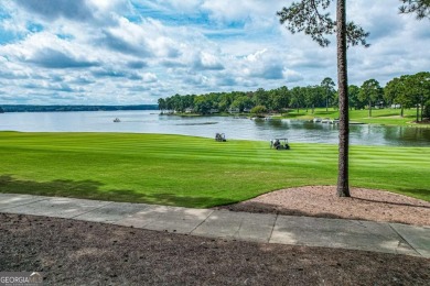 Located in the prestigious Great Waters neighborhood of Reynolds on Great Waters Course At Reynolds Plantation in Georgia - for sale on GolfHomes.com, golf home, golf lot