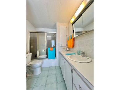 Located on a spacious corner lot in the heart of the highly on Fairway Village Golf Course in Florida - for sale on GolfHomes.com, golf home, golf lot