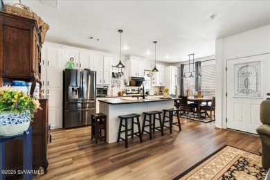 This 55+ community home features a beautifully appointed kitchen on Pine Shadows Golf Course in Arizona - for sale on GolfHomes.com, golf home, golf lot
