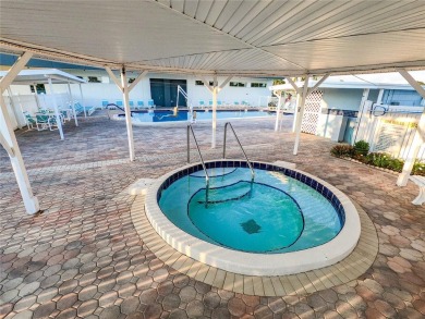 Located on a spacious corner lot in the heart of the highly on Fairway Village Golf Course in Florida - for sale on GolfHomes.com, golf home, golf lot