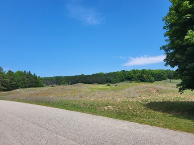 Build your dream home with views of the fairway and a return tee on Black Bear Golf Club in Michigan - for sale on GolfHomes.com, golf home, golf lot