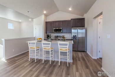 Lock & leave! Move-in ready and designed for low-maintenance on Raindance National Golf Course in Colorado - for sale on GolfHomes.com, golf home, golf lot