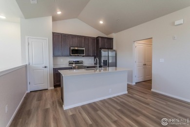 Lock & leave! Move-in ready and designed for low-maintenance on Raindance National Golf Course in Colorado - for sale on GolfHomes.com, golf home, golf lot