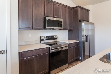 Lock & leave! Move-in ready and designed for low-maintenance on Raindance National Golf Course in Colorado - for sale on GolfHomes.com, golf home, golf lot
