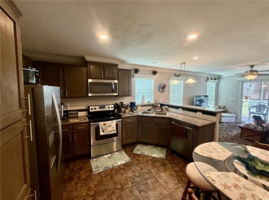 Why Buy New?!?! This immaculate and meticulously maintained 2017 on Riverwood Golf Club in Florida - for sale on GolfHomes.com, golf home, golf lot