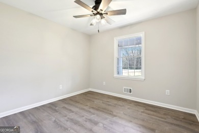 Welcome home to your charming & thoughtfully renovated all brick on Hunter Pope Country Club in Georgia - for sale on GolfHomes.com, golf home, golf lot