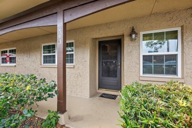 Welcome to this 55+ community of Pinewood Village.  This bright on Clearwater Executive Golf Course in Florida - for sale on GolfHomes.com, golf home, golf lot