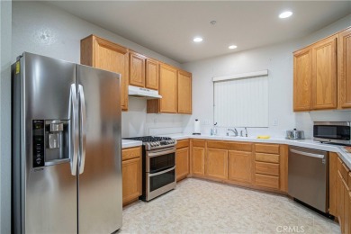 Welcome to this great two-story home nestled in the scenic on Sierra Lakes Golf Club in California - for sale on GolfHomes.com, golf home, golf lot