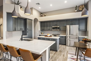 Beautifully updated Avron-built residence showcasing golf course on Legend Trail Golf Club in Arizona - for sale on GolfHomes.com, golf home, golf lot