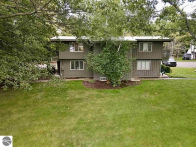 Hello Shanty Creek! Pack your bag, come on up, play and stay on Shanty Creek Golf Course in Michigan - for sale on GolfHomes.com, golf home, golf lot