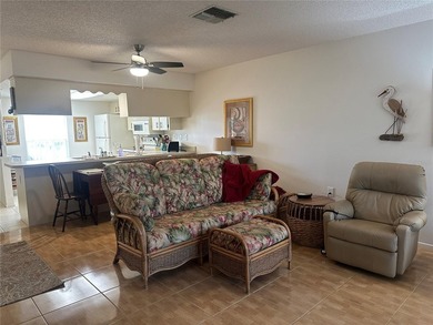 Enjoy easy Florida living in the desirable 55+ golf community of on Beacon Woods Golf Club in Florida - for sale on GolfHomes.com, golf home, golf lot