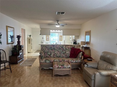 Enjoy easy Florida living in the desirable 55+ golf community of on Beacon Woods Golf Club in Florida - for sale on GolfHomes.com, golf home, golf lot