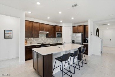 Discover elegant Florida living in this spacious 3-bedroom + den on River Hall Country Club in Florida - for sale on GolfHomes.com, golf home, golf lot