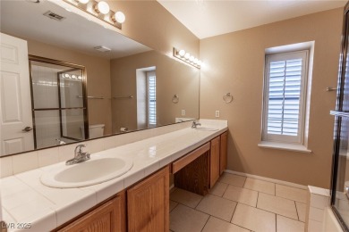 Welcome to this delightful 2-story residence nestled within the on Painted Desert Golf Club in Nevada - for sale on GolfHomes.com, golf home, golf lot
