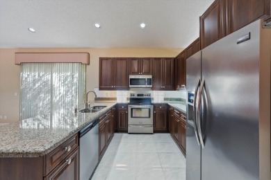 Welcome to this charming 3-bedroom, 3-bathroom home in the on Wycliffe Golf and Country Club in Florida - for sale on GolfHomes.com, golf home, golf lot