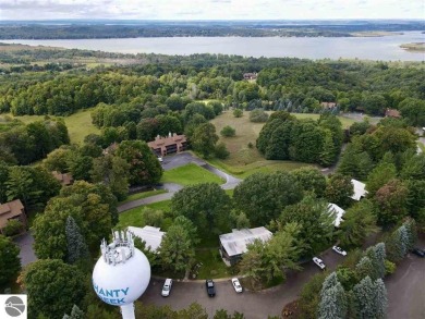 Hello Shanty Creek! Pack your bag, come on up, play and stay on Shanty Creek Golf Course in Michigan - for sale on GolfHomes.com, golf home, golf lot