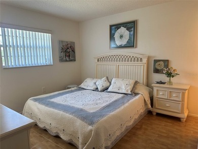 Enjoy easy Florida living in the desirable 55+ golf community of on Beacon Woods Golf Club in Florida - for sale on GolfHomes.com, golf home, golf lot