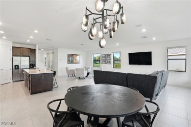 Discover elegant Florida living in this spacious 3-bedroom + den on River Hall Country Club in Florida - for sale on GolfHomes.com, golf home, golf lot
