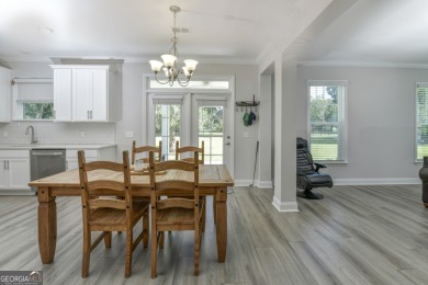 BETTER THAN NEW IN THE ESTATES OF SANCTUARY COVE.  SET ON OVER on The Golf Club At Sanctuary Cove in Georgia - for sale on GolfHomes.com, golf home, golf lot