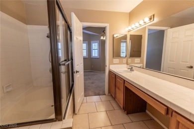 Welcome to this delightful 2-story residence nestled within the on Painted Desert Golf Club in Nevada - for sale on GolfHomes.com, golf home, golf lot