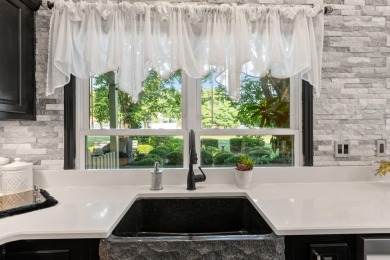 Experience vacation-style living every day in this beautifully on Griffin Gate Golf Resort in Kentucky - for sale on GolfHomes.com, golf home, golf lot
