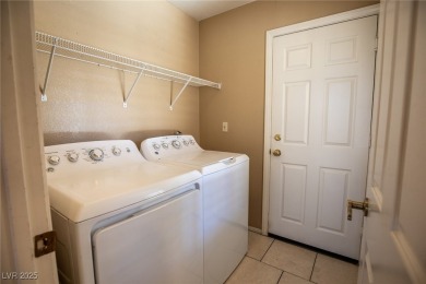 Welcome to this delightful 2-story residence nestled within the on Painted Desert Golf Club in Nevada - for sale on GolfHomes.com, golf home, golf lot