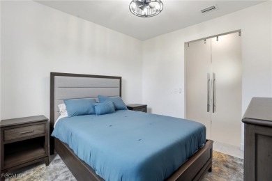 Discover elegant Florida living in this spacious 3-bedroom + den on River Hall Country Club in Florida - for sale on GolfHomes.com, golf home, golf lot