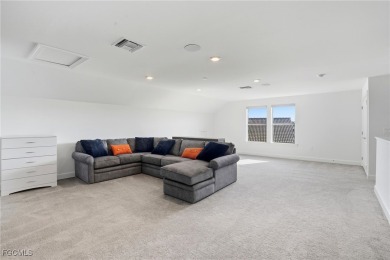 Discover elegant Florida living in this spacious 3-bedroom + den on River Hall Country Club in Florida - for sale on GolfHomes.com, golf home, golf lot