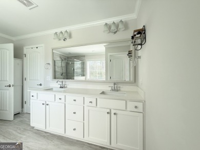 BETTER THAN NEW IN THE ESTATES OF SANCTUARY COVE.  SET ON OVER on The Golf Club At Sanctuary Cove in Georgia - for sale on GolfHomes.com, golf home, golf lot