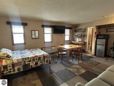 Hello Shanty Creek! Pack your bags and head up north to play and on Schuss Mountain Golf Club in Michigan - for sale on GolfHomes.com, golf home, golf lot