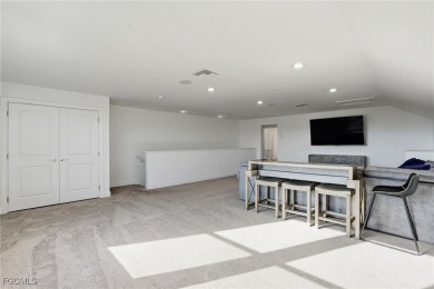 Discover elegant Florida living in this spacious 3-bedroom + den on River Hall Country Club in Florida - for sale on GolfHomes.com, golf home, golf lot
