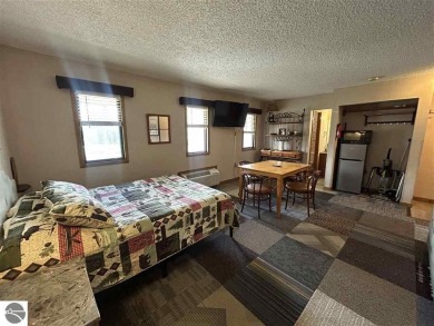 Hello Shanty Creek! Pack your bags and head up north to play and on Schuss Mountain Golf Club in Michigan - for sale on GolfHomes.com, golf home, golf lot