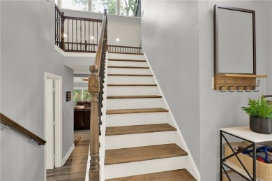 Welcome to 117 Lakeview Circle--an exceptional lakefront retreat on The Highlands Course at Lake Arrowhead in Georgia - for sale on GolfHomes.com, golf home, golf lot