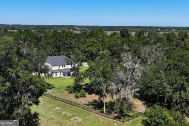 BETTER THAN NEW IN THE ESTATES OF SANCTUARY COVE.  SET ON OVER on The Golf Club At Sanctuary Cove in Georgia - for sale on GolfHomes.com, golf home, golf lot