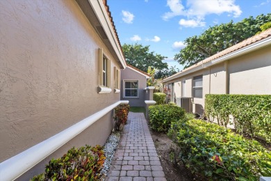 Welcome to this charming 3-bedroom, 3-bathroom home in the on Wycliffe Golf and Country Club in Florida - for sale on GolfHomes.com, golf home, golf lot