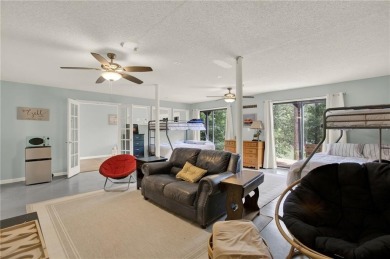 Welcome to 117 Lakeview Circle--an exceptional lakefront retreat on The Highlands Course at Lake Arrowhead in Georgia - for sale on GolfHomes.com, golf home, golf lot