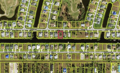 Build your dream home on this beautiful canal-front lot in the on Rotonda Golf and Country Club The Palms Course in Florida - for sale on GolfHomes.com, golf home, golf lot