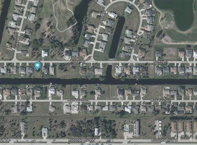 Build your dream home on this beautiful canal-front lot in the on Rotonda Golf and Country Club The Palms Course in Florida - for sale on GolfHomes.com, golf home, golf lot