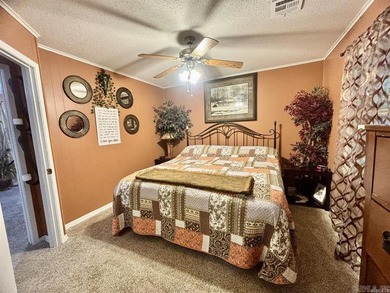 WHAT A BUY!  Adorable and well maintained three-bedroom home on DeSoto Golf Course in Arkansas - for sale on GolfHomes.com, golf home, golf lot