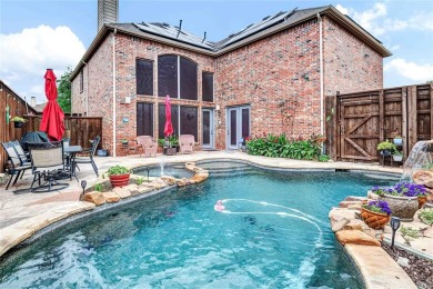 This impressive two-story, 5-bedroom, 4 and a half bathroom home on The Trails of Frisco Golf Club in Texas - for sale on GolfHomes.com, golf home, golf lot