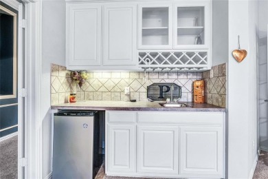 This impressive two-story, 5-bedroom, 4 and a half bathroom home on The Trails of Frisco Golf Club in Texas - for sale on GolfHomes.com, golf home, golf lot