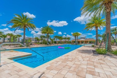 Welcome to one of the most desirable homes in Harmony Reserve, a on Esplanade Golf and Country at Lakewood Ranch in Florida - for sale on GolfHomes.com, golf home, golf lot