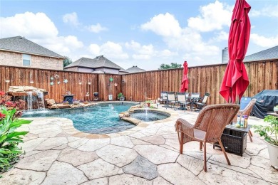 This impressive two-story, 5-bedroom, 4 and a half bathroom home on The Trails of Frisco Golf Club in Texas - for sale on GolfHomes.com, golf home, golf lot
