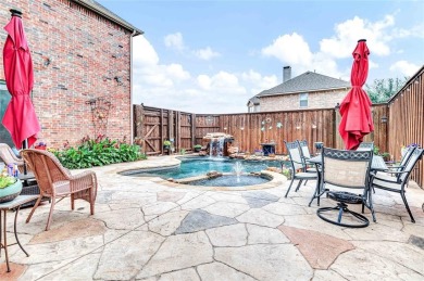 This impressive two-story, 5-bedroom, 4 and a half bathroom home on The Trails of Frisco Golf Club in Texas - for sale on GolfHomes.com, golf home, golf lot