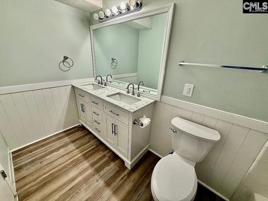 Come home and relax overlooking the water and boats in the cove on Club At Rawls Creek in South Carolina - for sale on GolfHomes.com, golf home, golf lot