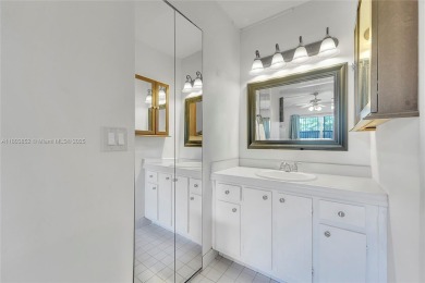 Updated custom kitchen, bathroom and floors, beautiful view of on Sunrise Lakes Phase III in Florida - for sale on GolfHomes.com, golf home, golf lot