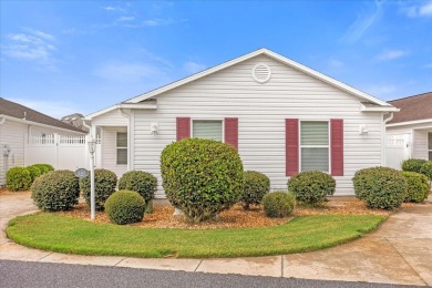 Welcome to this charming 3-bedroom, 2-bathroom bungalow villa on Egret Championship Golf Course in Florida - for sale on GolfHomes.com, golf home, golf lot