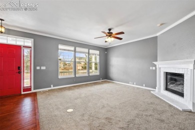 This lovely, spacious Woodmen Hill home awaits you.  Great curb on Antler Creek Golf Course in Colorado - for sale on GolfHomes.com, golf home, golf lot