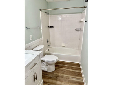 Come home and relax overlooking the water and boats in the cove on Club At Rawls Creek in South Carolina - for sale on GolfHomes.com, golf home, golf lot